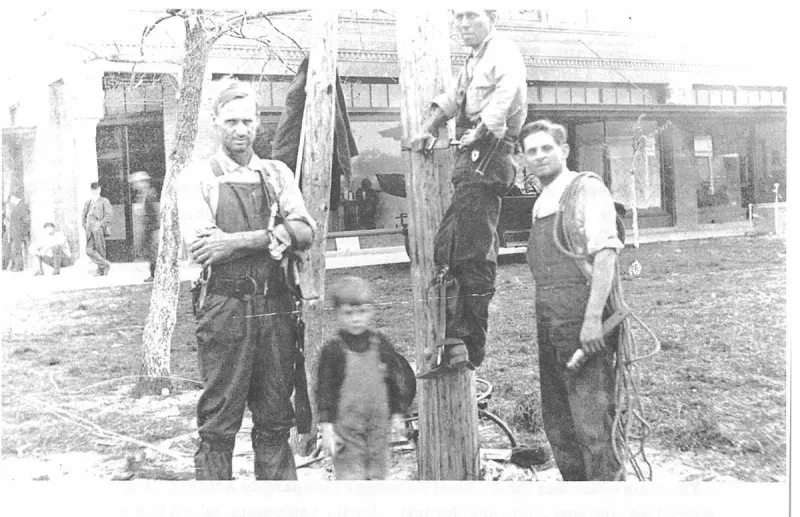 Installing the first telephone pole in 1914